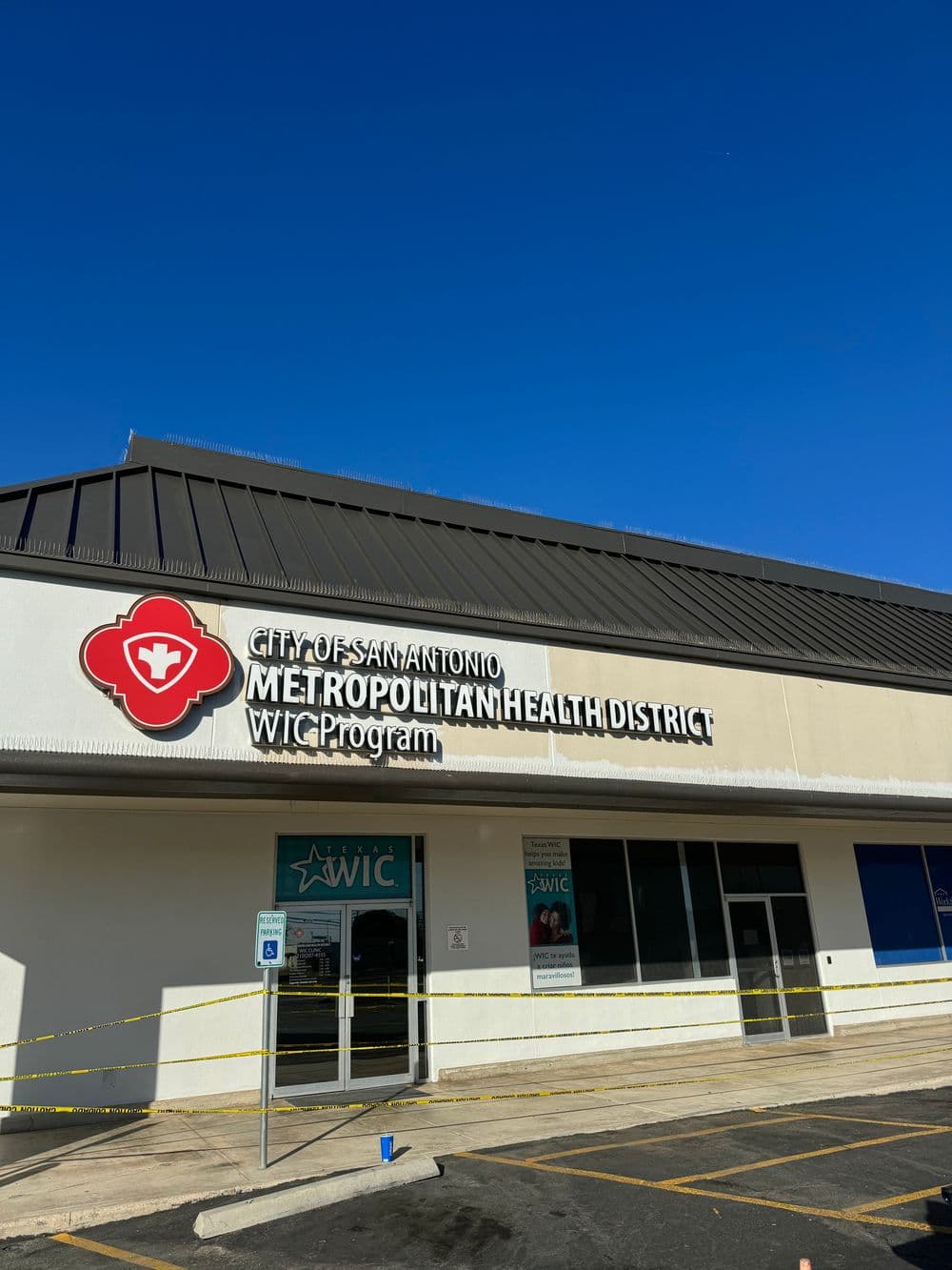 City of San Antonio Metropolitan Health District building with WIC Program signage.